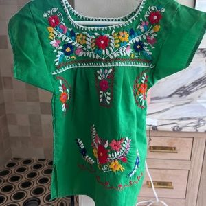 Hand stitched baby dress from Mexico